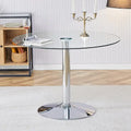 Table de salle à manger ronde avec élégant plateau en verre et pieds métalliques robustes