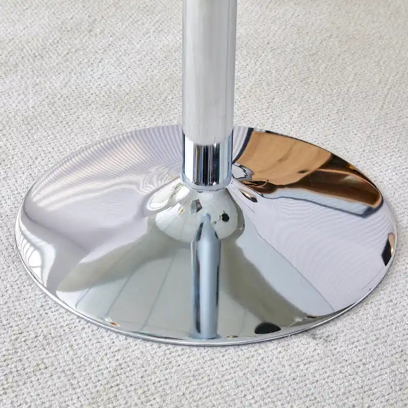 Table de salle à manger ronde avec élégant plateau en verre et pieds métalliques robustes
