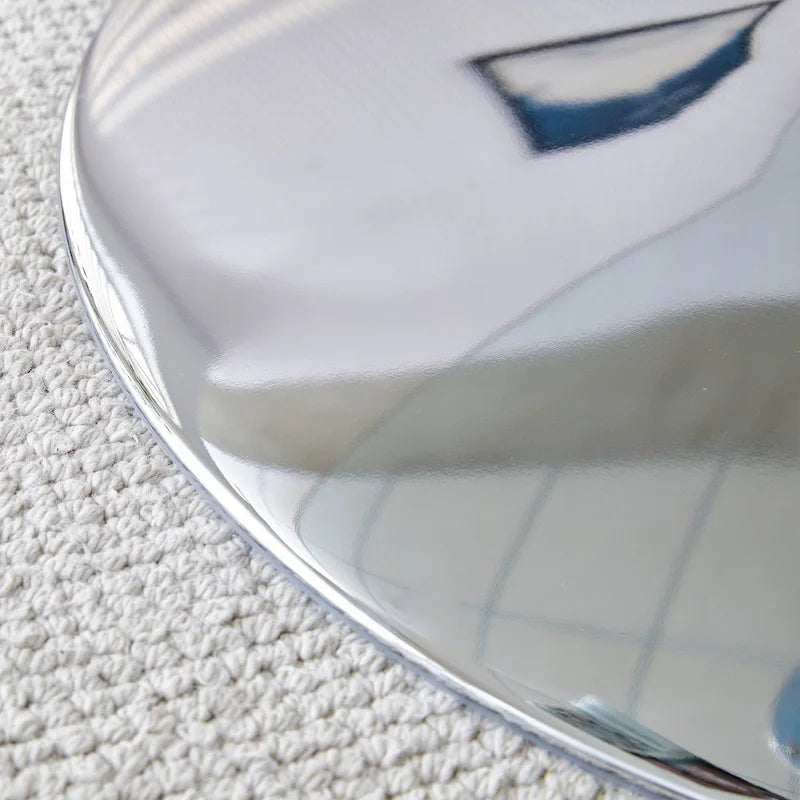 Table de salle à manger ronde avec élégant plateau en verre et pieds métalliques robustes