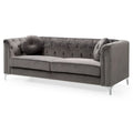 Samtsofa mit Knopfheftung