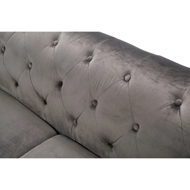 Samtsofa mit Knopfheftung
