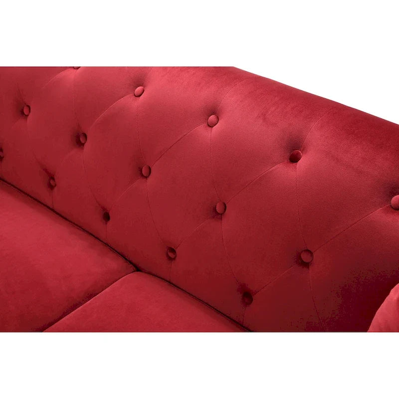 Samtsofa mit Knopfheftung
