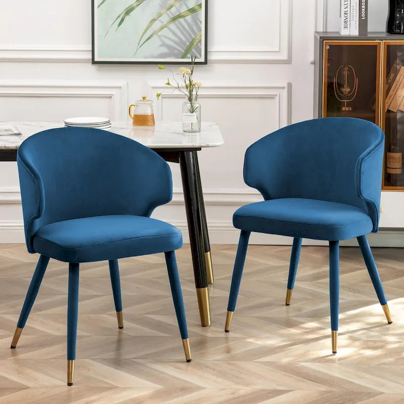 Sillas de comedor de terciopelo con detalles dorados