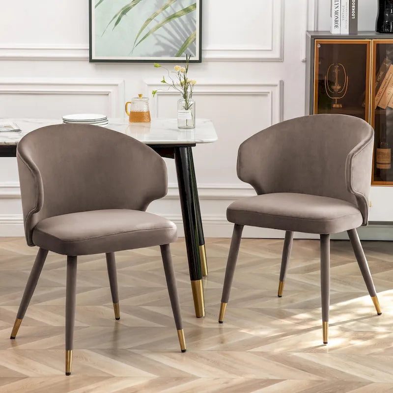 Sillas de comedor de terciopelo con detalles dorados