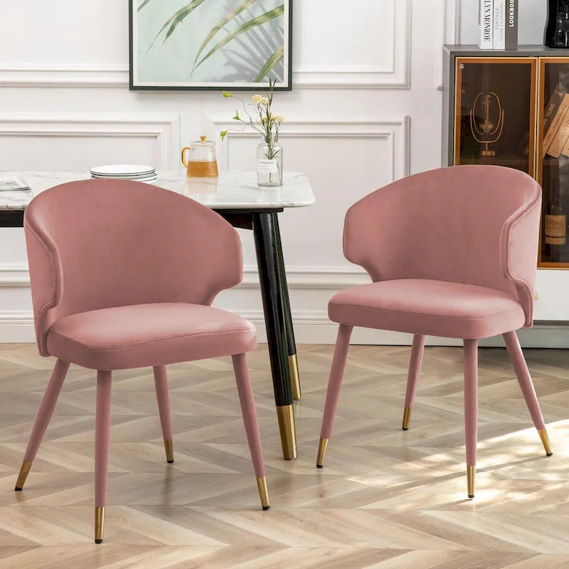 Sillas de comedor de terciopelo con detalles dorados
