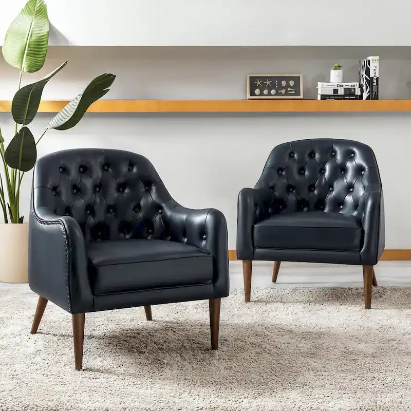 Sillón clásico de cuero genuino con patas de madera y respaldo capitoné