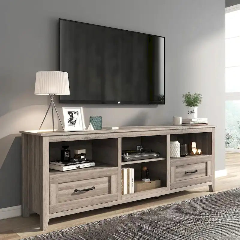 Meuble TV gris avec tiroirs de rangement et gestion des câbles