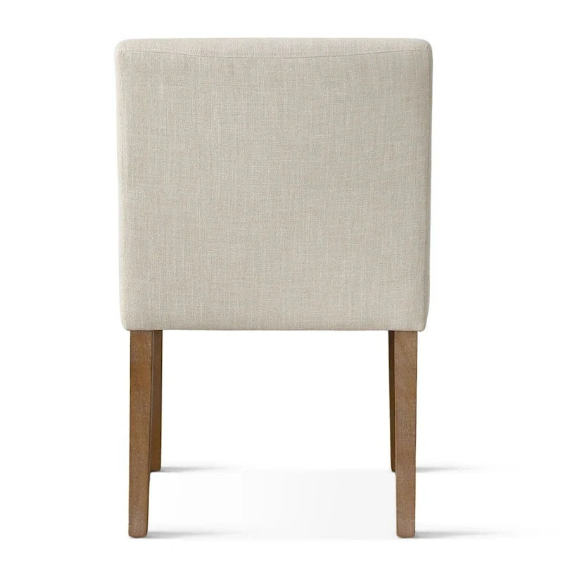 Sillón tapizado en lino