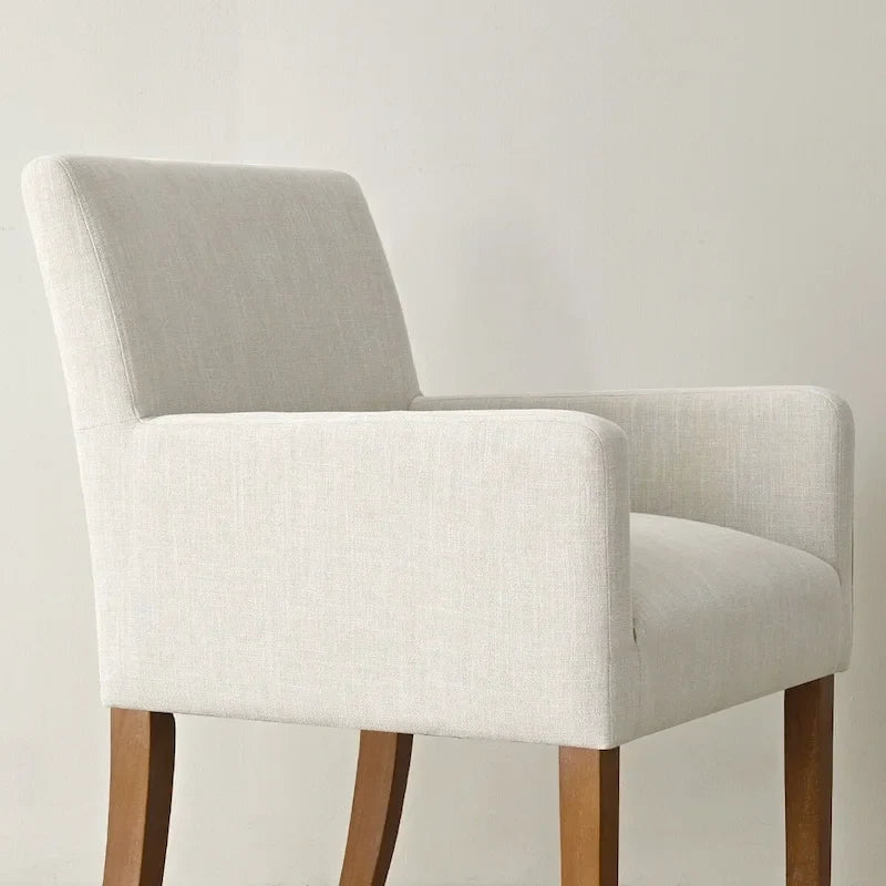 Sillón tapizado en lino